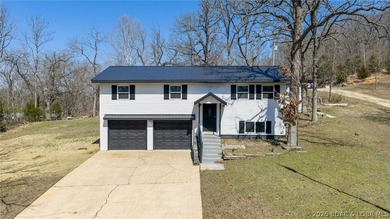 Lake view home with modern updates! This newly remodeled home - photo 1