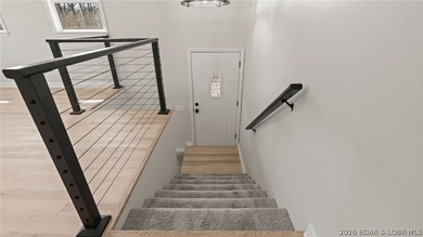 Lake view home with modern updates! This newly remodeled home - photo 3