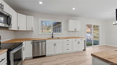 Lake view home with modern updates! This newly remodeled home - photo 6