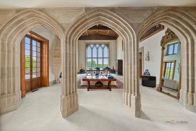 Experience the distinctive charm of this English Manor-an