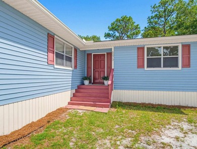 Situated on just over an acre, this beautifully updated - photo 4