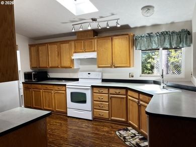 Nestled in the desirable Coast Village gated community, this - photo 27