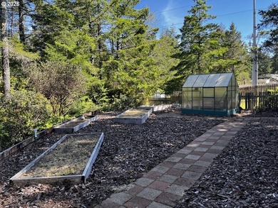 Nestled in the desirable Coast Village gated community, this - photo 41