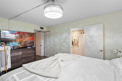 Welcome to this stunning 2-bed 2-bath condo located on the first - photo 13
