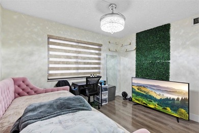 Welcome to this stunning 2-bed 2-bath condo located on the first - photo 15