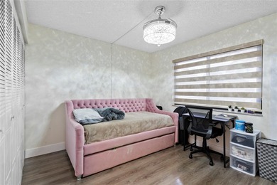 Welcome to this stunning 2-bed 2-bath condo located on the first - photo 16