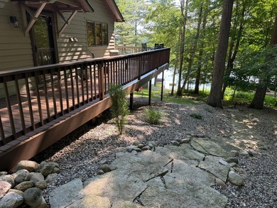 BIRD LAKE CHARMER. Tucked in the woods, this year-round home - photo 24