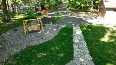 BIRD LAKE CHARMER. Tucked in the woods, this year-round home - photo 25