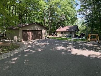 BIRD LAKE CHARMER. Tucked in the woods, this year-round home - photo 29