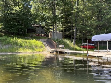 BIRD LAKE CHARMER. Tucked in the woods, this year-round home - photo 36