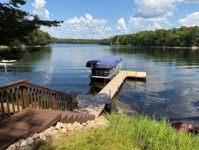 BIRD LAKE CHARMER. Tucked in the woods, this year-round home - photo 39