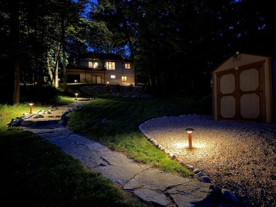 BIRD LAKE CHARMER. Tucked in the woods, this year-round home - photo 43