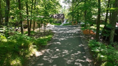 BIRD LAKE CHARMER. Tucked in the woods, this year-round home - photo 45