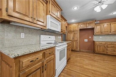 Welcome to main-level living at its finest. Step into a grand