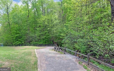 This 1.56 acre, CUL DE SAC GOLF COURSE LOT is located in the - photo 13