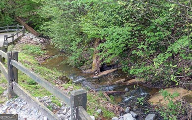 This 1.56 acre, CUL DE SAC GOLF COURSE LOT is located in the - photo 14