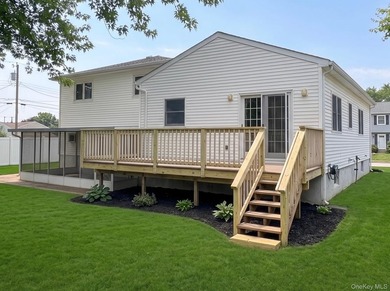 Welcome to this beautifully maintained and expanded split-level - photo 22