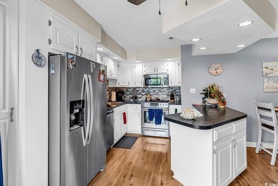 Enjoy coastal living in this beautifully updated second-floor - photo 16
