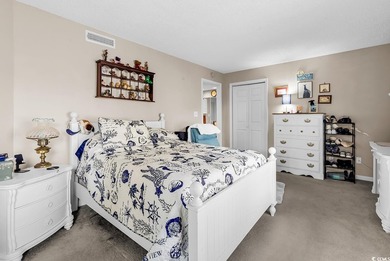 Enjoy coastal living in this beautifully updated second-floor - photo 18