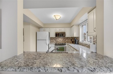 Come see this perfectly laid out condo that comes fully - photo 7