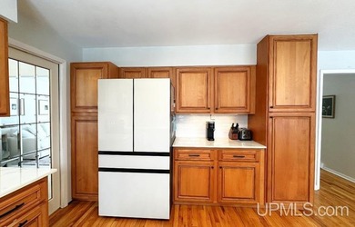 Nestled in one of Marquette's most desirable neighborhoods, this - photo 11
