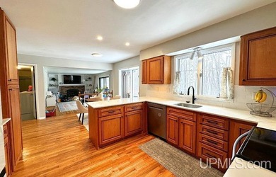 Nestled in one of Marquette's most desirable neighborhoods, this - photo 12