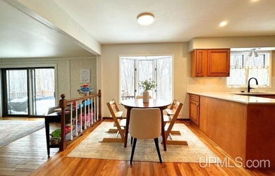 Nestled in one of Marquette's most desirable neighborhoods, this - photo 13