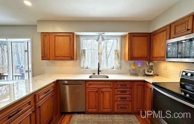 Nestled in one of Marquette's most desirable neighborhoods, this - photo 14