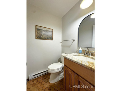 Nestled in one of Marquette's most desirable neighborhoods, this - photo 16