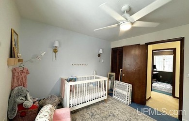 Nestled in one of Marquette's most desirable neighborhoods, this - photo 19