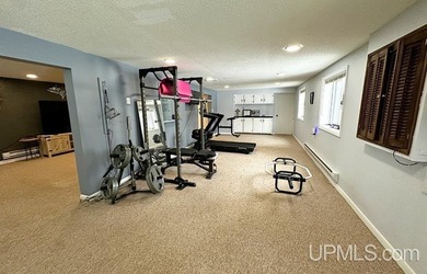 Nestled in one of Marquette's most desirable neighborhoods, this - photo 29