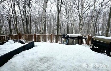 Nestled in one of Marquette's most desirable neighborhoods, this - photo 30