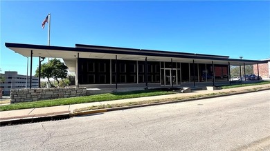 Welcome to this exquisite two-story corner commercial building