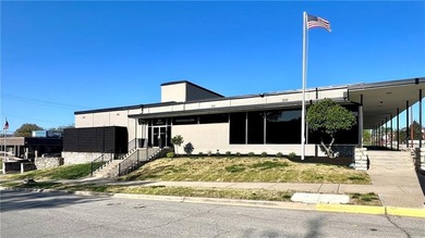 Welcome to this exquisite two-story corner commercial building