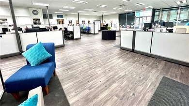 Welcome to this exquisite two-story corner commercial building