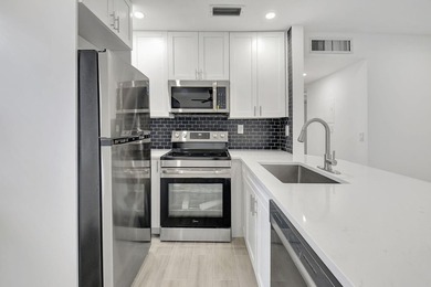 Beautifully updated 2-bedroom, 2-bathroom residence renovated in - photo 12