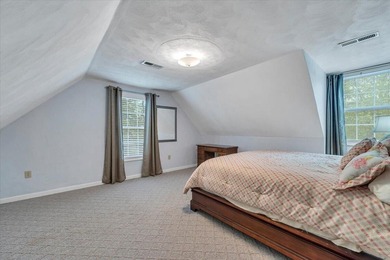 Nestled on 13.8 private acres with water frontage on beautiful - photo 21