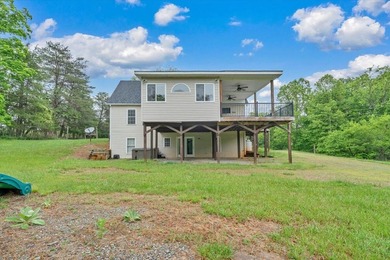 Nestled on 13.8 private acres with water frontage on beautiful - photo 34