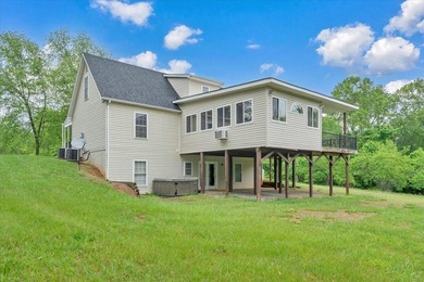 Nestled on 13.8 private acres with water frontage on beautiful - photo 35