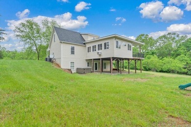 Nestled on 13.8 private acres with water frontage on beautiful - photo 36