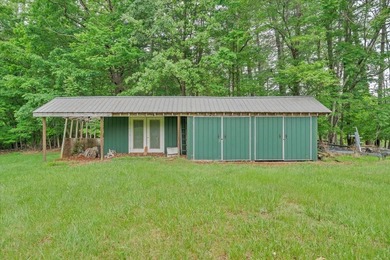 Nestled on 13.8 private acres with water frontage on beautiful - photo 41