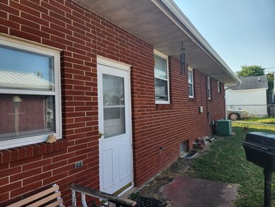 Handicap accessible two bedroom brick ranch! Newer walk-in