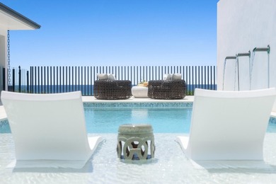 Discover the epitome of modern coastal luxury with this - photo 7
