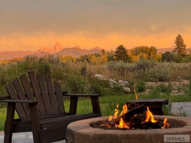Set beneath wide-open skies with the Tetons rising in the - photo 5