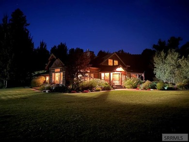 Set beneath wide-open skies with the Tetons rising in the - photo 7