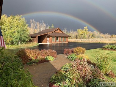 Set beneath wide-open skies with the Tetons rising in the - photo 8