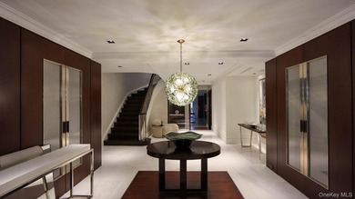 This exceptional over 20-foot-wide townhouse is discreetly - photo 5
