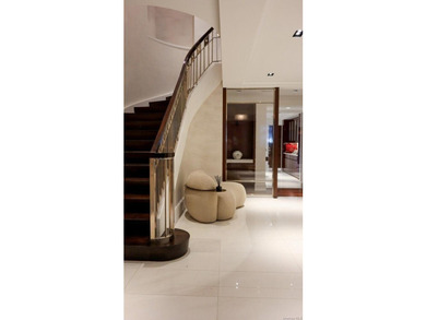 This exceptional over 20-foot-wide townhouse is discreetly - photo 8
