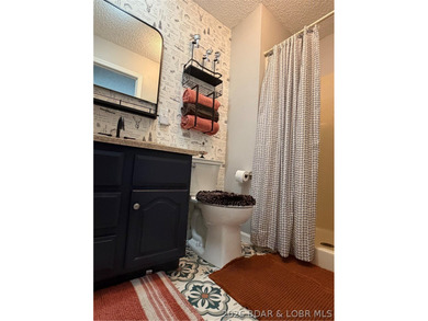 This beautifully updated 2-bedroom, 2 1/2-bath home offers an - photo 16