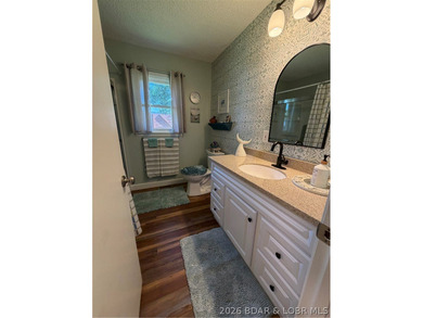 This beautifully updated 2-bedroom, 2 1/2-bath home offers an - photo 18